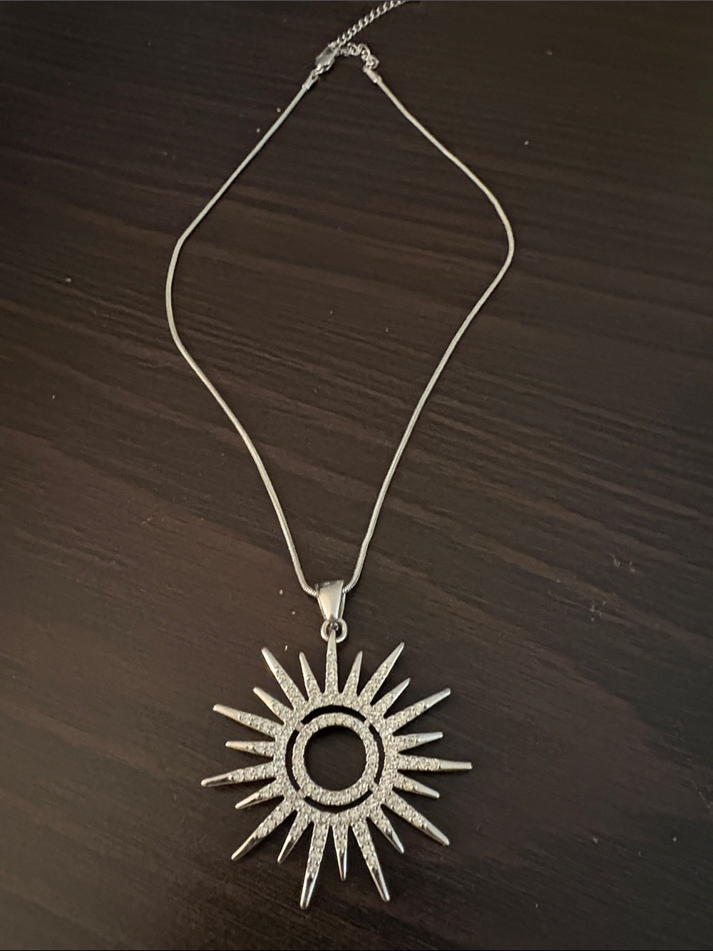 225)Radiant Silver Sunburst Pendant Necklace